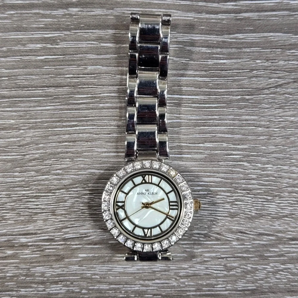 Anne Klein Women's Mother Of Pearl Women's Quartz Watch10/8671 silver tone S5.5